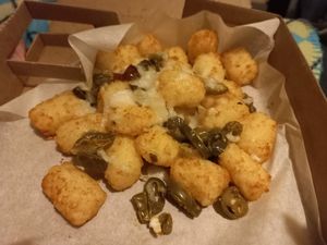 Vegan cheese potato tots with jalapeno at Papa John's in West Wickham