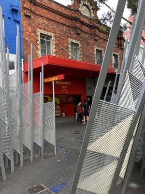 Location reference, behind the statue in the street corner  at Mr.Charlie's - Sydney in Redfern