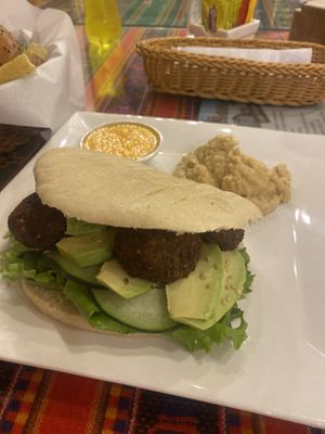 Falafel sandwich (I added avocado) (highly recommend)   at La Casa de Bamboo in Huacachina