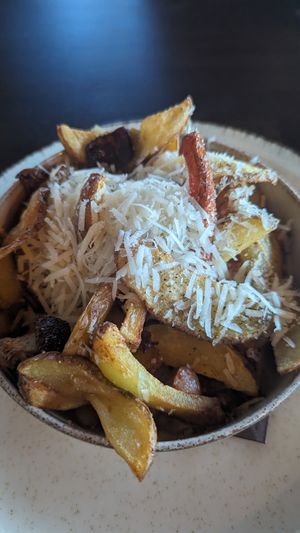 Baked potatoes with vegan cheese at Gostilna Zlati Grič in Slovenske Konjice