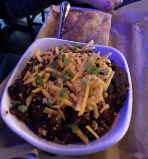 Vegan chili with dairy-free cheese.  at The Five6 in Rogers