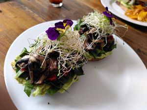 Avocado toast with mushrooms and sprouts at Astro Café Bistro in San Cristobal De Las Casas