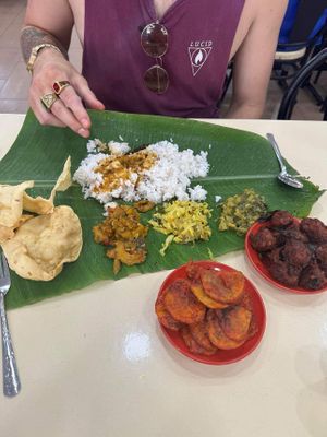 Banana leaf spread with a few extras    at Sri Kortumalai Pillayar Restaurant (Najib's Corner) in Kuala Lumpur