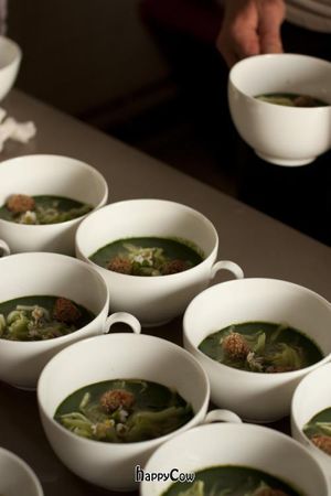 Steinbeisser Experimental Gastronomy Summer Edition took place from 6 - 8 July 2012. Nettle soup with cucumber, barley bread and eatable flowers. at Steinbeisser Experimental Gastronomy in Amsterdam