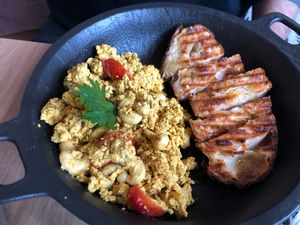 Scrambled cashew tofu with toast. Good! at superplanty in Zagreb