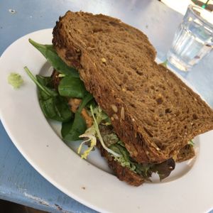 beastly large and healthy vegan lentil spread sandwich  at Studio K in Amsterdam
