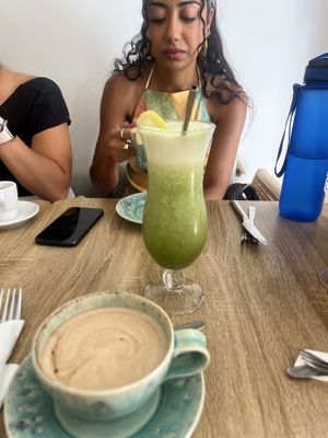 Detox green juice & oat cap   at Sage Brunch in Lisbon