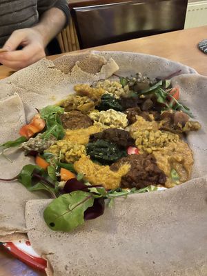 Selection of vegan dishes with injera  at Semhar in Amsterdam