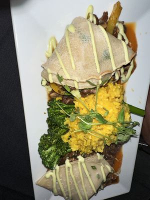 Crepes with mushroom and paella rice! Was super delish  at The Studio in Hilton Head Island