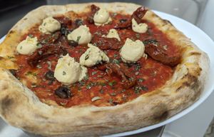 In our Zenzera the ginger is dusted so that it remains gentle on the palate. Mid-dry tomatoes, taggiasca olives, chickpeas hummus, basil and high quality extra virgin olive oil. at Lestro Pizza Restaurant in Brescia