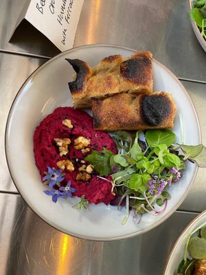 Beetroot and orange hummus with locally baked focaccia at Almanac Cafe in Plymouth