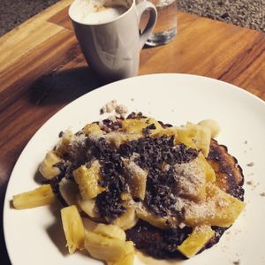 latte and pancakes at Luv Burger in Samara