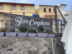 Beschriftung  at Bar Cagliari in Castelsardo