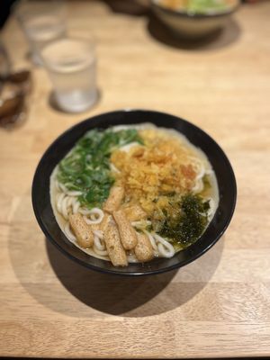 Tempura batter and tofu topped udon noodles and broth   at Breakfast Udon - 朝うどん in Kyoto