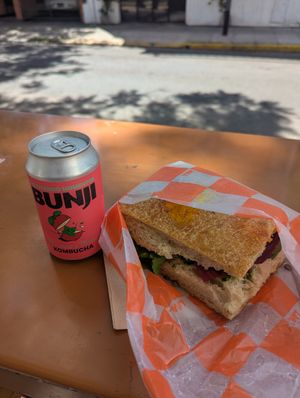 Kombucha y sandwich at La Manteca Negra in Buenos Aires