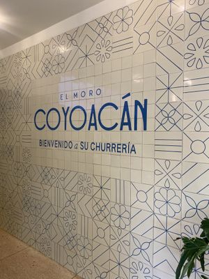 Welcome Signage Near Ordering Station  at Churrería El Moro - Coyoacán in Mexico City
