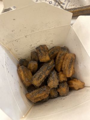 Close-Up of Moritos Churros (de Muerte) 💀 Con Escénica de Azahar    at Churrería El Moro - Coyoacán in Mexico City