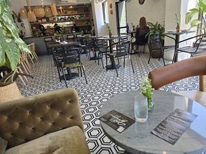 Couch lounge and table seating at HAAM - Caribbean Plant Cuisine in Brooklyn