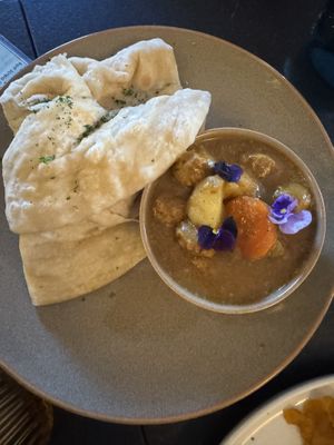 Goat curry roti  at HAAM - Caribbean Plant Cuisine in Brooklyn