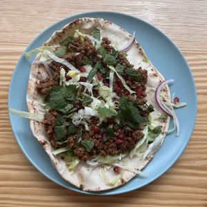 Flat bread with vegan  meat  at Bataat in Amsterdam