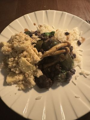 Feijão preto com cogumelos e farofa de banana  at Casa Vegetariana in Porto