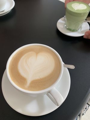 Latte mit Hafermilch   at Weird Space Café Friedrichstadt in Dusseldorf