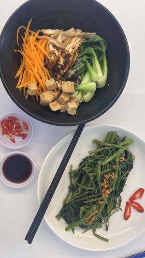 Morning glory and noodles  at Grounded Chay - Plant Based Cuisine in Nha Trang