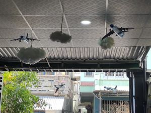 Water bottles turned into airplane decor ✈️ ☁️ at Grounded Chay - Plant Based Cuisine in Nha Trang