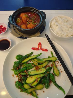 Tomato Tofu and Garlic fried baby pumpkin. Both great!!!!! at Grounded Chay - Plant Based Cuisine in Nha Trang