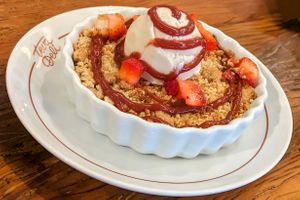 Apple crumble with ice cream. This was so excellent we bought another one. at Teva Deli in Rio De Janeiro