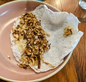 Smoked mushroom and fake mozarella tapioca, opened for the photo. Tapioca itself was decent enough, but the filling elevated it to make it the best tapioca I've ever had. at Teva Deli in Rio De Janeiro