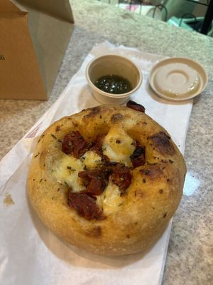 The extra pesto in oil is too die for with the focaccia   at Teva Deli in Rio De Janeiro