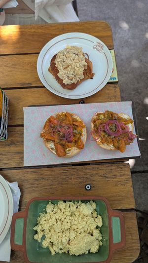 Almond croissant, lox bagel, tofu scramble at Teva Deli in Rio De Janeiro