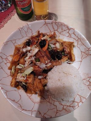 Vegan dish with vegetables, tofu and rice in a tasty sauce at China-Restaurant Singapore in Mayrhofen
