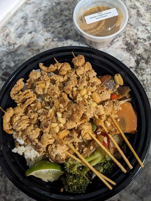Soy curl satay skewers with stir fried veggies, Jasmine rice, and peanut sauce at Cornflower Cafe in Appleton