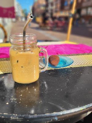 Flat white and chilli chocolate raw ball at Café Myka in Malmo