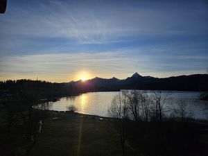 Sunrise view from the penthouse balcony at Dreimäderlhaus - Boutique Hotel am Weissensee in Fuessen