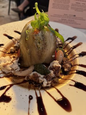 Eggplant and pepper with vegan cheese, garlic and cream cheese (huge piece of bread on the side)  at Meshek Barzilay in Tel Aviv