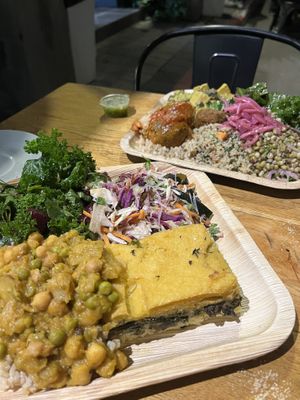 Buffet with a lot of options and gluten free options too, "meatballs", quinoa, salads, vegetable curry, something similar to lasagna, tofu, tempeh  at Meshek Barzilay in Tel Aviv