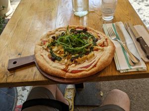 Artichoke & Kalamata Olive Pizza at Meshek Barzilay in Tel Aviv
