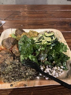 Big plate from the hot food and salad bar  at Meshek Barzilay in Tel Aviv