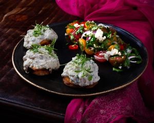 mong been grilled pitas with eggplants and tehini salad at Meshek Barzilay in Tel Aviv