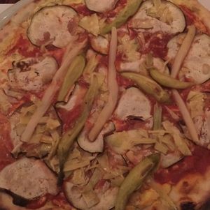 vegan pizza with tofu, eggplant, asparagus, and chili peppers at Pizzeria Foculus in Ljubljana