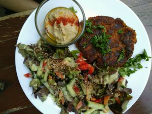 Vegan bantling with hummus and salad at Pele-Mele in Berlin