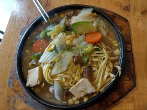 Sizzler noodles with vegan steak at Surn Yi Vegetarian Restaurant in Phnom Penh