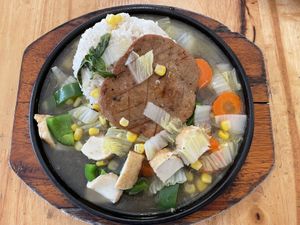 Sizzling black pepper veggie steak with rice, $3.25  at Surn Yi Vegetarian Restaurant in Phnom Penh