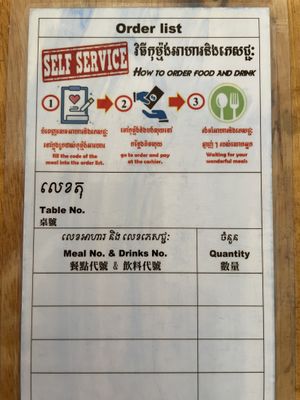To order, you complete this order card. Simply write the item number and quantity, and take it to the cashier.  at Surn Yi Vegetarian Restaurant in Phnom Penh
