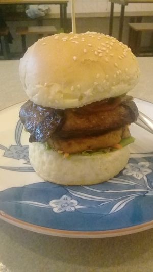 Vegan buger (comes with cup of coke or sprite) for $2. I asked I if the bun was really vegan and the girl who speaks English well said yes, no milk or eggs in the bun. at Surn Yi Vegetarian Restaurant in Phnom Penh