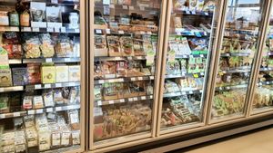 fridge filled with vegan cheese and mock meat #Veganuary at Veganz in Berlin