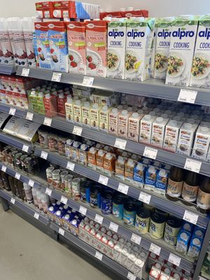 Cooking milk and cream  at Veganz in Berlin